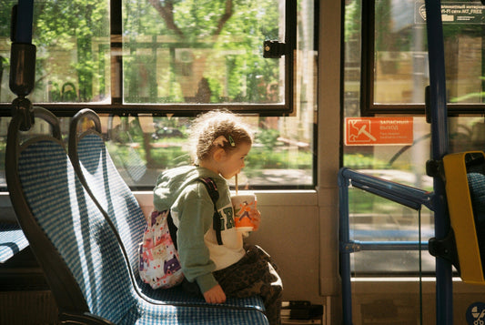 multi function school activity bus with child on it